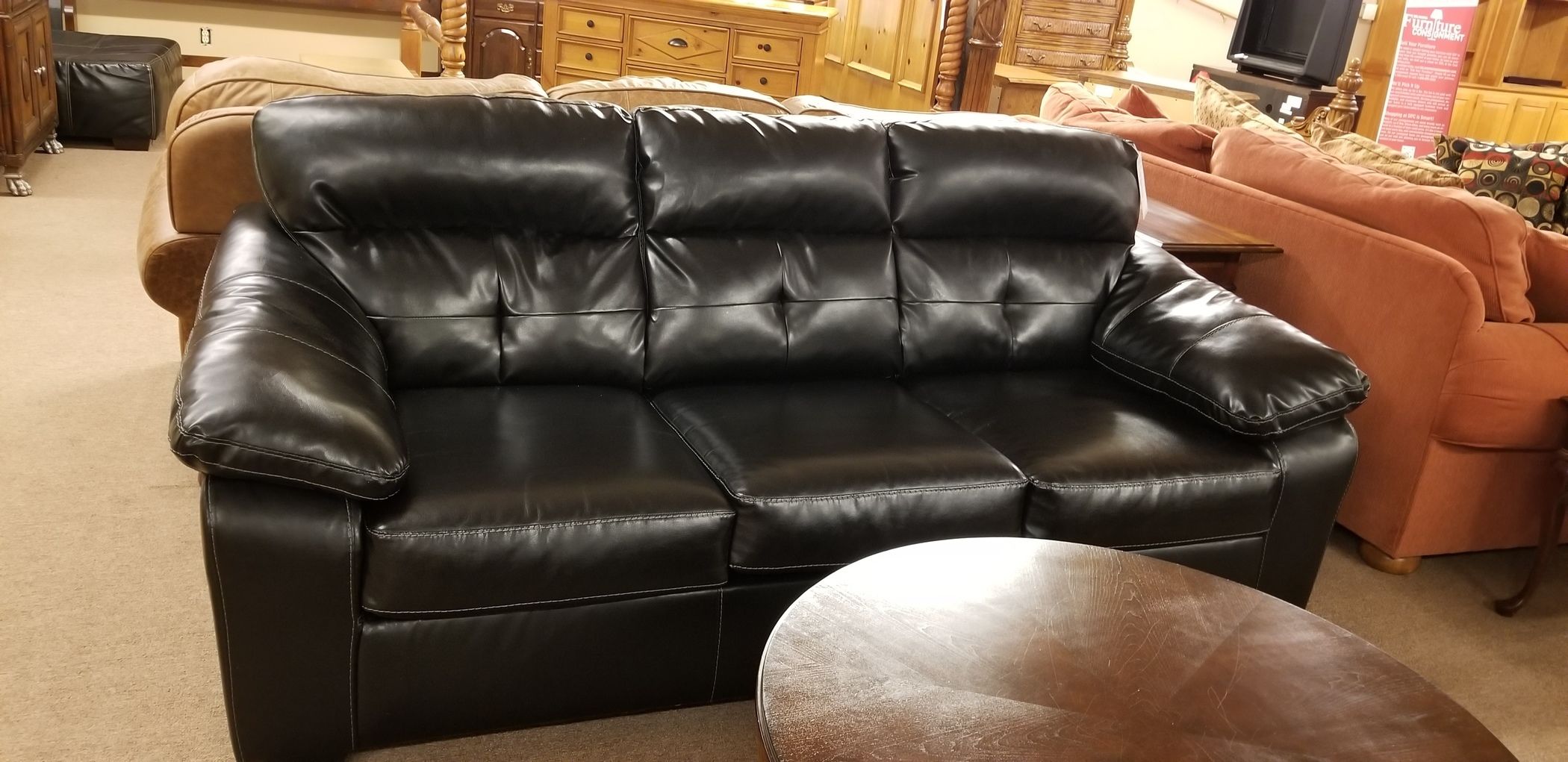 ASHLEY BLACK LEATHER SOFA Delmarva Furniture Consignment
